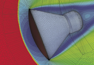 The Advancing Layer Mesher uses a pseudo-structured mesh approach to generate layered, primarily structured grids from wall boundaries beyond the boundary layer. This meshing approach is suitable for computations involving bow shocks, as depicted in this simulation of the re-entry of the Crew Exploration Vehicle. Image courtesy of CD-adapco.