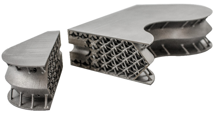 Engineers at Materialise and Atos reduced material usage by 66% in this aerospace insert with topology optimization and lattice structure design. Image courtesy of Materialise.